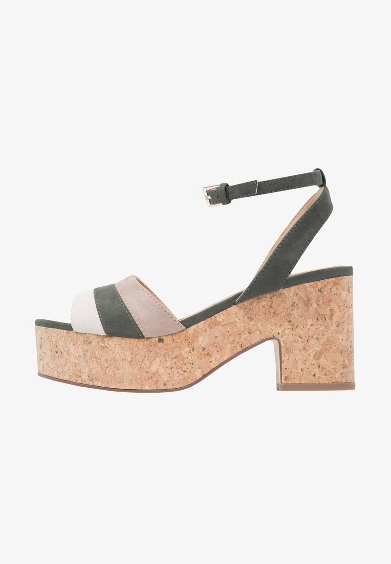 Sandales plateformes à bout ouvert avec un talon compensé en liège. Comprennent des rayures en daim vert et beige ainsi qu'une bride de cheville réglable.