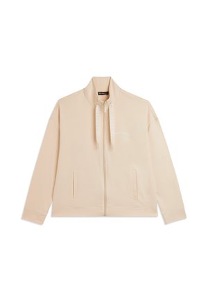 Giacca beige con zip, collo alto, due tasche frontali, cordini brandizzati e logo discreto sul petto.