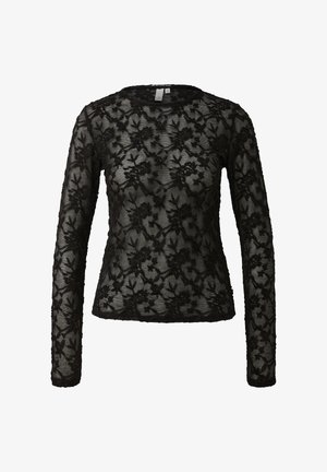Haut à manches longues en dentelle noire avec un motif floral, décolleté rond et texture transparente. Présente une broderie délicate et une silhouette ajustée.