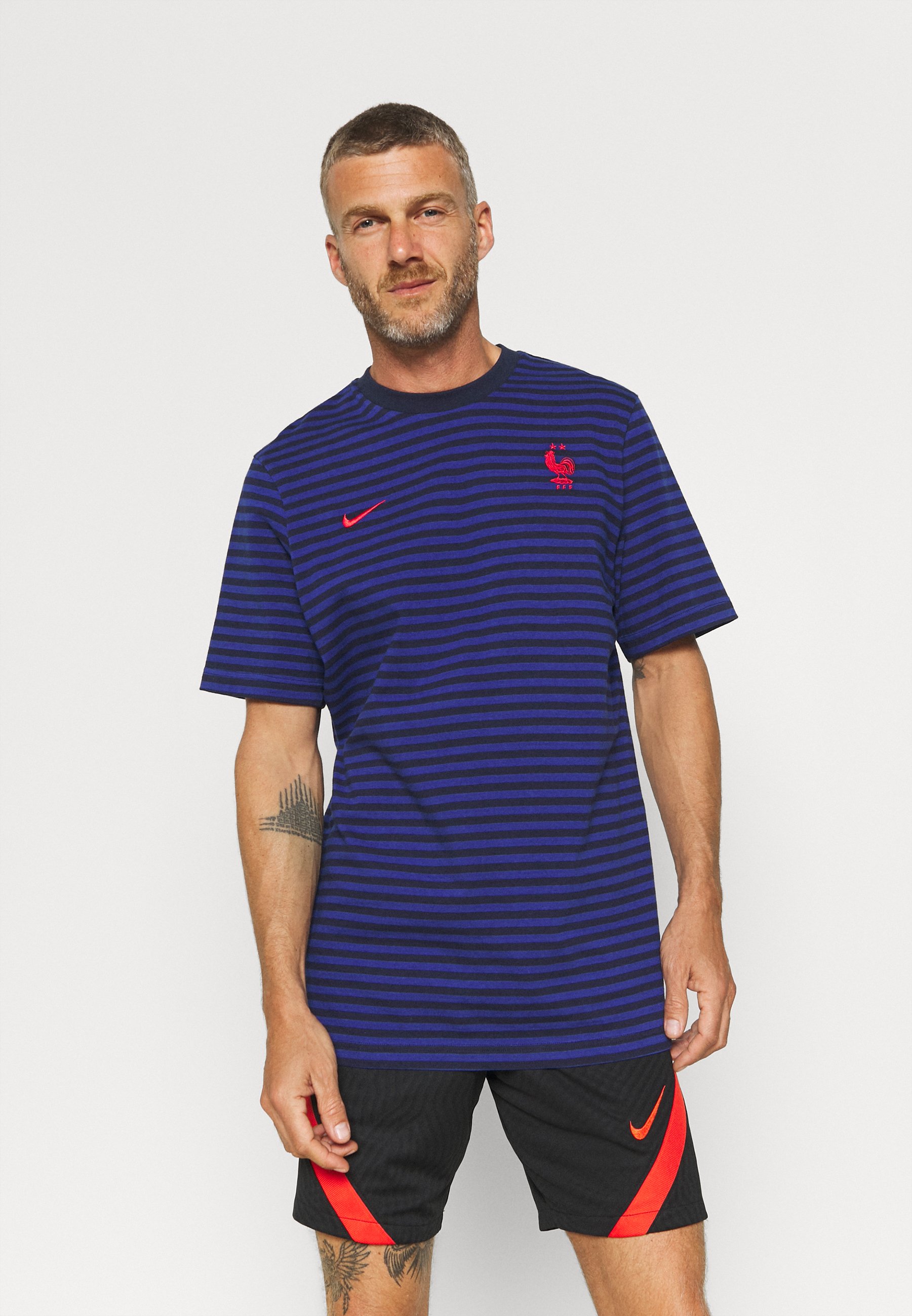 royal blue and red nike shirt