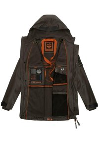 Brun jakke med foret innside, oransje detaljer, flere lommer og hette. Har glidelås som lukking og merkede lapper.