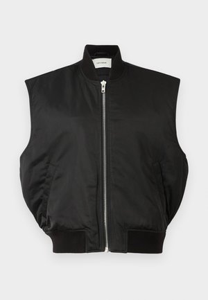 Črna brezrokavna bomber jakna z zip zapiranjem, rebrastim ovratnikom in robom ter stranskima žepoma. Narejena iz gladkega, lahkega materiala.