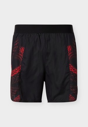Black athletic shorts with wide waistband and red snake scale pattern on side panels.