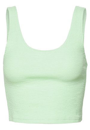 Light green textured fabric crop top with wide shoulder straps and a square neckline.