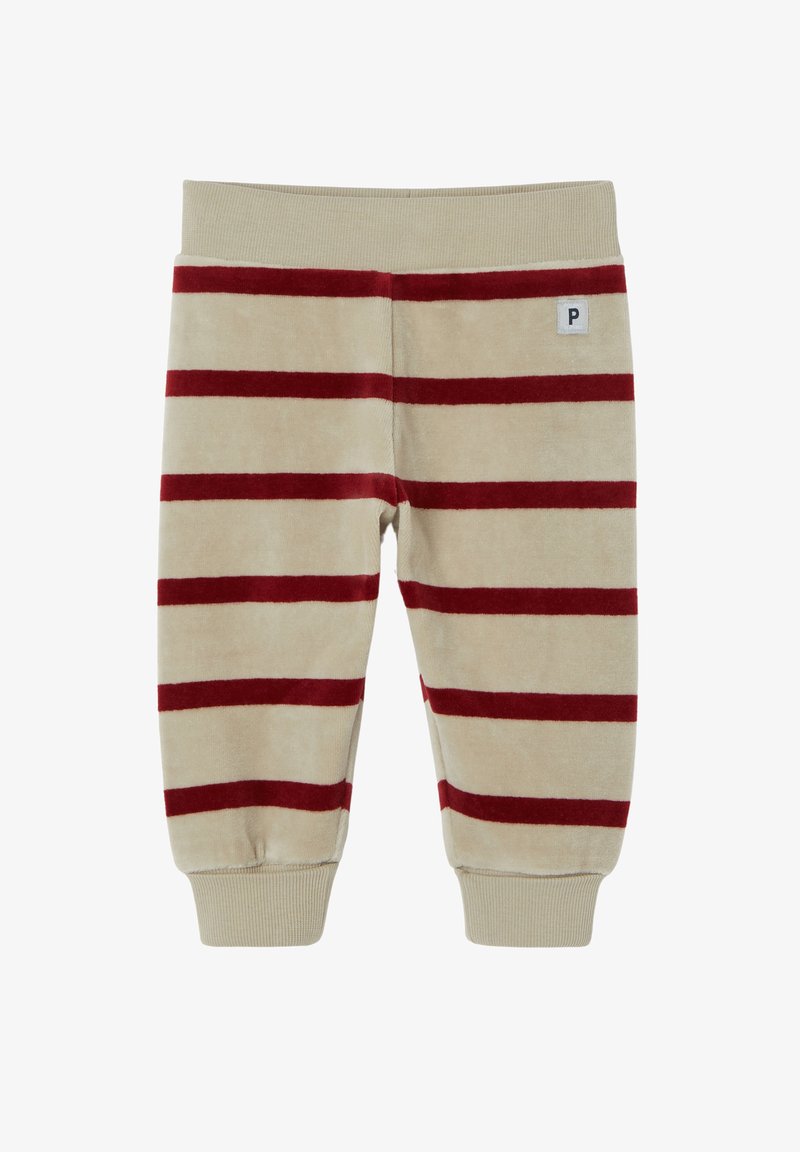 Beige velour-housut, joissa on punaiset vaakaraitat, joustava vyötärö ja ribattu helma; edessä pieni "P"-merkki.