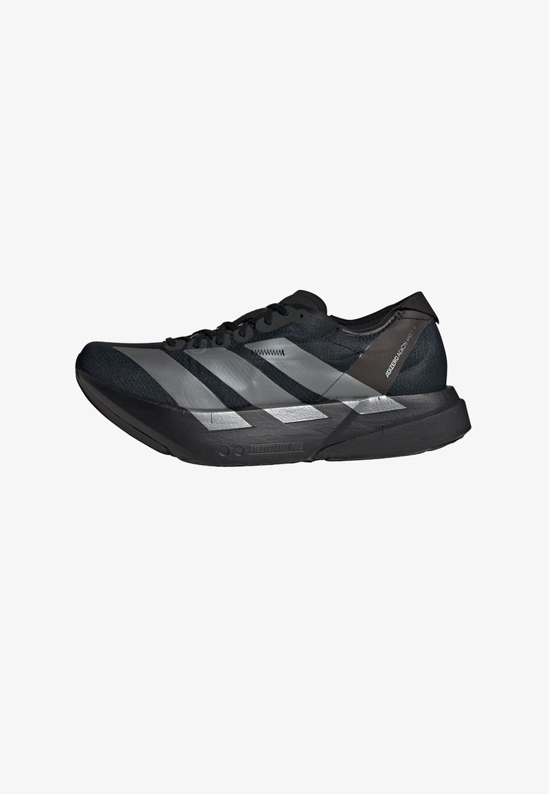 Black running shoe with a textured mesh upper, featuring three silver stripes, a lightweight sole, and a sleek, streamlined design.