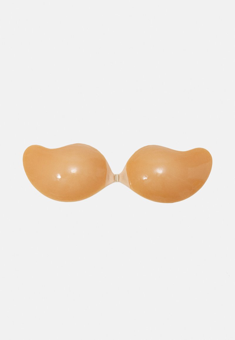Adhesive silicone bra in a nude shade, featuring a smooth, contoured shape with a connecting strap in the center for secure fit.