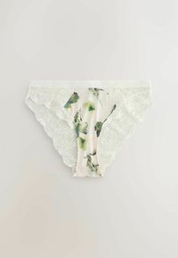 Pitkällä pitsireunuksella koristellut alushousut, joissa on vihreä kukkakuosi ja hieno valkoinen kangas, sileä vyötärönauha ja aaltoilevat pitsireunat.