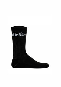 Calzino in cotone nero con texture a coste, punta e tallone rinforzati. Presenta il logo bianco "ellesse" sulla parte superiore. Lunghezza classica.