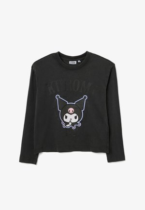 Zwarte lange mouwen shirt van katoen, met een cartoonfiguur grafiek met een roze accent op de borst en een ronde halslijn.