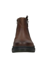 Braune Leder-Stiefelette mit glatter Oberfläche, runder Zehenpartie, seitlichem Reißverschluss und schwarzer Gummisohle. Verfügt über dezente Steppnähte entlang des Obermaterials.
