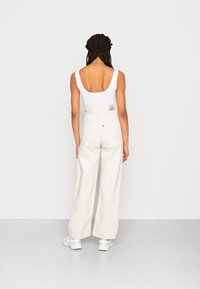 Levi's® HIGH LOOSE - Calças de ganga de perna direita - natural amber