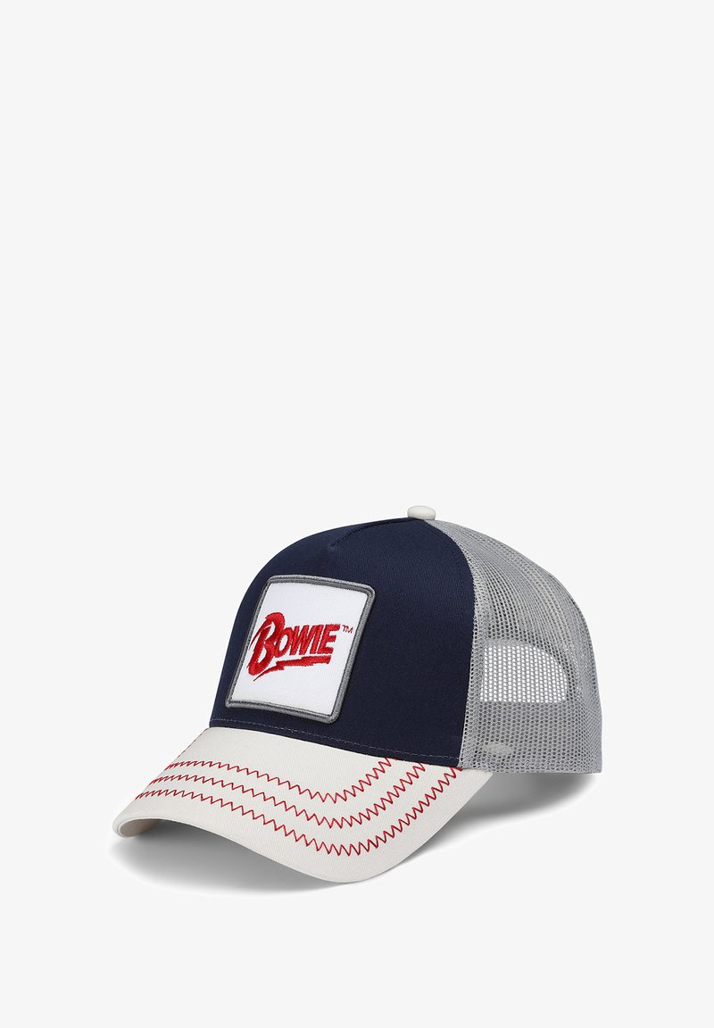 Navy blue baseball cap with a white and red patch displaying "Bowie," gray mesh back, cream-colored visor with red stitching detail.