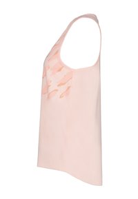 Top sin mangas de color rosa claro con una textura suave, escote redondeado y patrones abstractos de color naranja pálido en el frente. Corte ajustado.