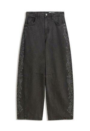 Schwarze Jeans mit weitem Bein, hohem Bund, Vordertaschen, Knopfverschluss und gepunkteten Blumenmustern entlang beider äußerer Seiten-Nähte.