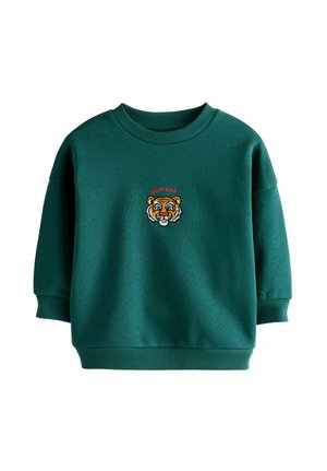 Green sweatshirt with a round neckline and dropped shoulders. Features embroidered tiger graphic and text "WILD ONE." Soft, textured fabric.