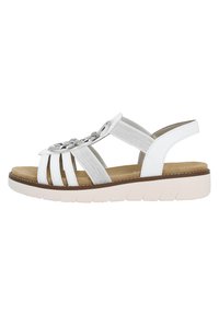 Witte sandaal met een synthetisch bovenwerk, voorzien van een zilveren decoratieve ketting, elastische banden en een gevoerde zool met een gemetste lichtroze basis.