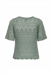 Blusa de ganchillo verde claro con mangas cortas, intrincados patrones de calado, dobladillo en ondas y cuello redondo.