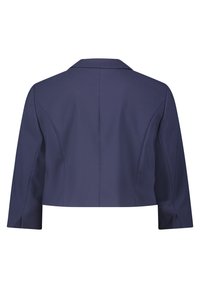 Geknipte marineblauwe jas, gestructureerd ontwerp, getailleerde pasvorm, gelapte kraag en lange mouwen. Gladde stof met subtiele stikdetails.
