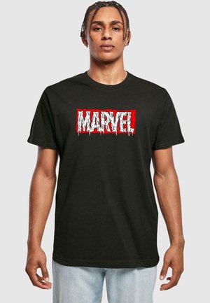 Black cotton t-shirt featuring a textured white and red "MARVEL" logo with dripping details, crew neck design, and short sleeves.