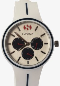 White silicone watch with a round silver dial, black subdials, and red accents. Features a logo "SUPERGA" and blue detailing on the strap.