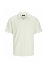 Polo a maniche corte in morbido tessuto beige chiaro con vestibilità rilassata, dotato di colletto classico e una texture sottile.