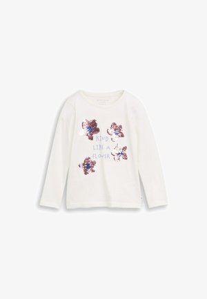 Weißes Langarmhemd mit fünf glänzenden, blumenförmigen Pailletten und dem Text "Kind like a flower" in helllila auf der Vorderseite.