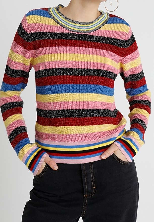 Multicolored striped knit sweater featuring horizontal bands of pink, red, yellow, and blue, with ribbed texture and a round neckline.