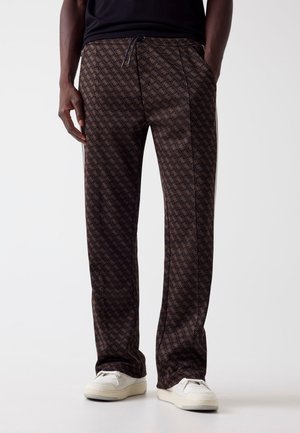 - Spodnie treningowe