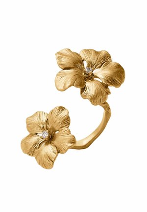 Anillo de oro con dos diseños de flores texturizadas, cada uno con un pequeño diamante central, sobre un fondo blanco.