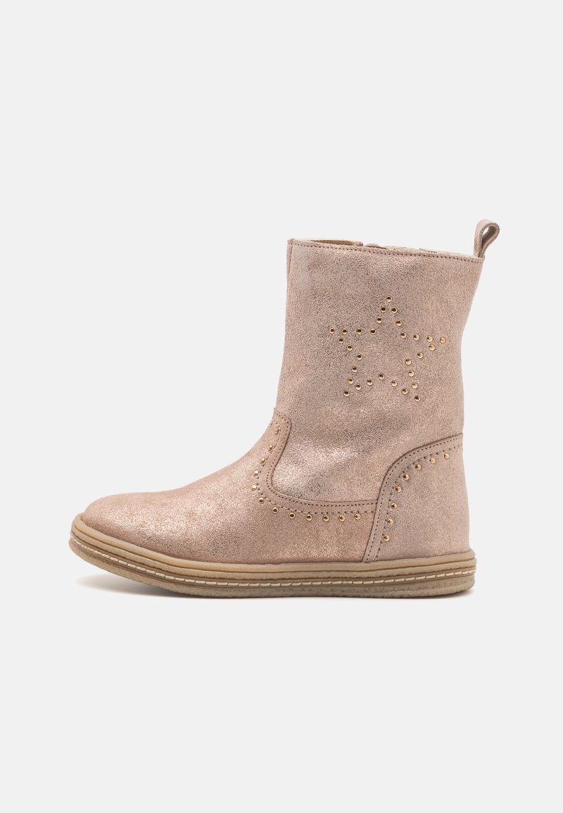 Pink suede ankle boot with star design and gold stud accents. Features a textured finish and a flexible sole, with a pull tab for easy wear.