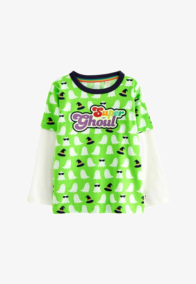 Zöld, rövid ujjú ing "Super Ghoul" grafikával, fehér szellempatternnel, sapkában és napszemüvegben. Tengerész kerek nyakú.