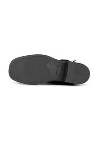 Zwarte rubberen zool met textuur voor grip. Heeft een platte vorm en een gladde rand, ontworpen voor stabiliteit en duurzaamheid. Maat 37 gemarkeerd.