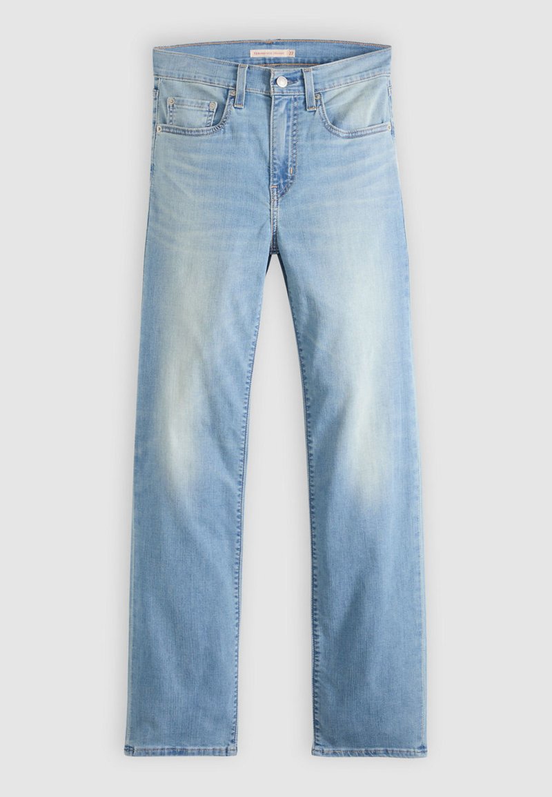 Jean bleu clair à jambes droites avec cinq poches, fermeture à bouton, et détails délavés subtils sur les cuisses et les genoux.