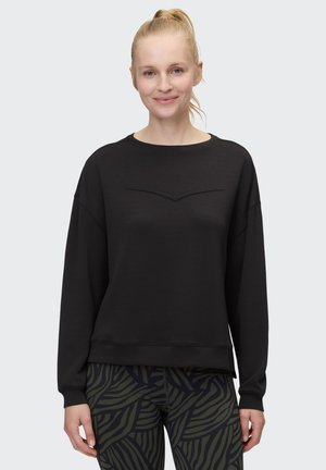 Schwarzes Sweatshirt mit Rundhalsausschnitt, langen Ärmeln und einem dezenten Zickzack-Detail auf der Brust. Weicher, strukturierter Stoff.