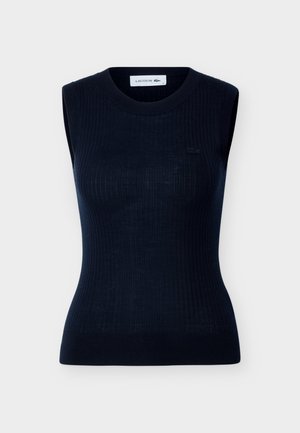 Mouwloze zwarte gebreide top met ronde halslijn, subtiele verticale ribbels en klein Lacoste-logo op de linkerborst.