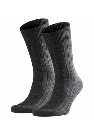 Calzini grigi a coste con tessuto texturizzato, dotati di polsino elastico nella parte superiore e punta rinforzata per una maggiore durata.