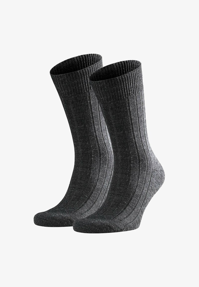 Graue, gerippte Socken aus einem strukturierten Stoff, mit elastischem Bündchen oben und verstärktem Zehenbereich für zusätzliche Haltbarkeit.