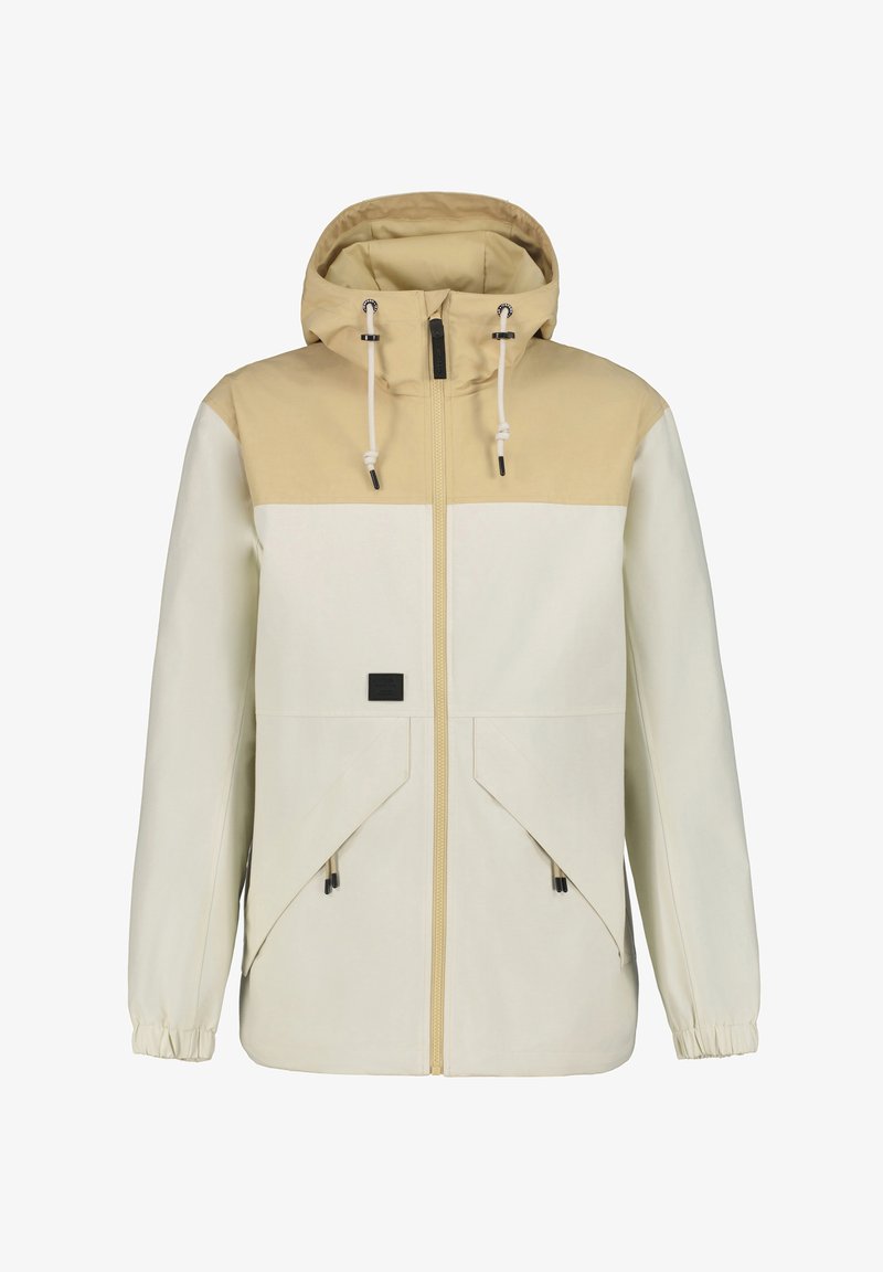 Letvægtsjakke i beige og creme med hætte, frontlynlås, to store skrå lommer og elastiske manchetter. Har justerbare snore.