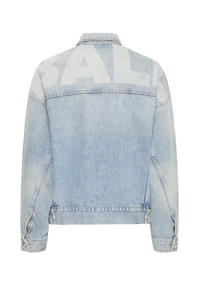 Light blue denim jacket with subtle large white text "BAL" across the upper back, buttoned cuffs, and classic stitching details.