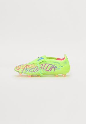 Lime green soccer cleat with a textured upper, featuring pink accents and "PREDATOR" in bold purple. Designed for traction with spike studs.