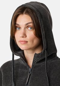 Kapuzensweatshirt mit Reißverschluss aus dunkelgrauem Rippstoff; ausgestattet mit Kordelzügen, Reißverschluss und strukturiertem Obermaterial.