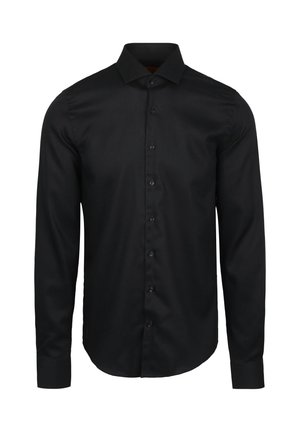 Zwarte lange mouwen shirt gemaakt van gladde stof. Kenmerkt zich door een klassieke kraag, volledige knoopsluiting en afgeronde zoom. Mouwen zijn met knopen vastgezet.