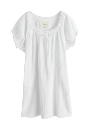 White, lightweight tunic with a textured fabric, short puff sleeves, a rounded neckline, and five buttons along the front. Delicate trim accents.