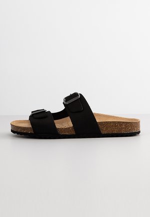 BRIONIA - Sandalias planas - black