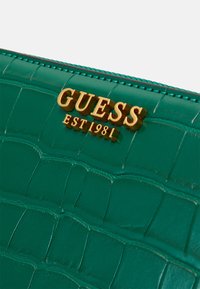 Guess LAUREL LARGE ZIP AROUND - Punge - emerald