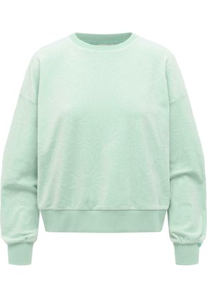 Jasnozielona bluza z okrągłym dekoltem z delikatnym wytłaczanym wzorem kwiatowym oraz ściągaczami na mankietach i dole.