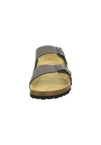 Black slide sandal with two adjustable straps, a cork footbed, and a textured rubber outsole. Smooth leather-like upper finish.
