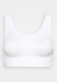 Biały sportowy biustonosz bezszwowy z szerokimi ramiączkami i dekoltem w kształcie litery U, zaprojektowany dla wygody i wsparcia.