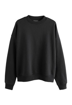 Mustad dressipluus ümmarguse kaelusega, langenud õlgadega ning soonikuliste mansettide ja äärega. Valmistatud pehmest, tekstuuriga kangast. Lihtne disain.